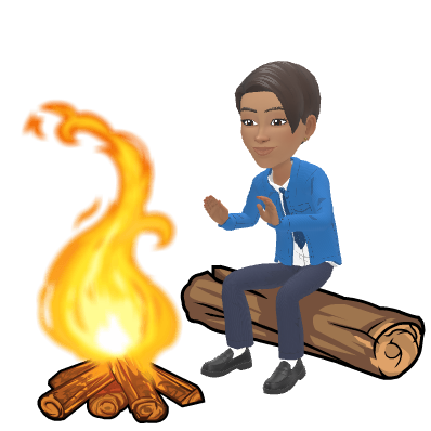 Teenage Maz sitting beside a campfire