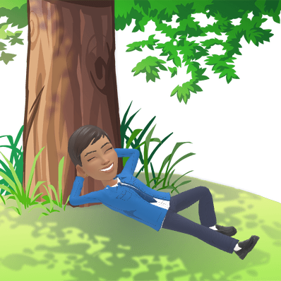 Teenage Maz lying under a tree outdoors