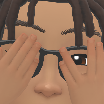 Ree hiding inside a cardboard box