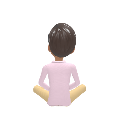 Ree sitting with her back to the viewer