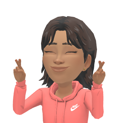 Young Ree smiling with her eyes closed and fingers crossed
